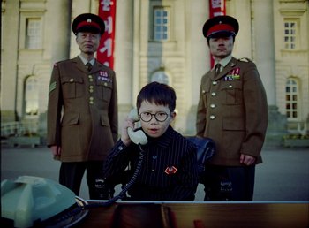 Movie still from “Young Fathers - Toy” (2018), directed by Salomon Ligthelm – Medium shot, Low angle