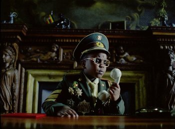 Movie still from “Young Fathers - Toy” (2018), directed by Salomon Ligthelm – Medium shot, Low angle