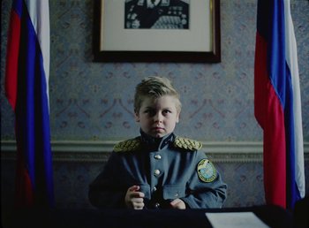 Movie still from “Young Fathers - Toy” (2018), directed by Salomon Ligthelm – Medium shot, Low angle