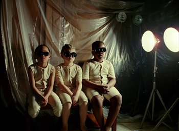 Movie still from “Young Fathers - Toy” (2018), directed by Salomon Ligthelm – Medium shot, High angle