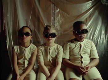 Movie still from “Young Fathers - Toy” (2018), directed by Salomon Ligthelm – Medium shot, Low angle