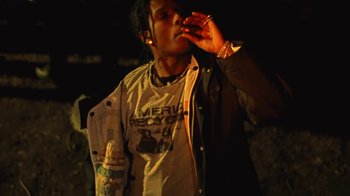 Movie still from “Asap Rocky - Forever” (2018), directed by Dexter Navy – Medium shot, Low angle