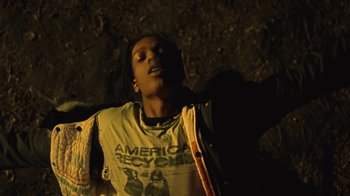 Movie still from “Asap Rocky - Forever” (2018), directed by Dexter Navy – Medium shot, Low angle
