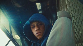 Movie still from “A.CHAL - Cuánto” (2018), directed by Dexter Navy – Close Up shot, Low angle