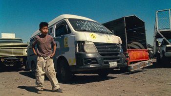 Movie still from “A.CHAL - Cuánto” (2018), directed by Dexter Navy – Medium shot, Low angle