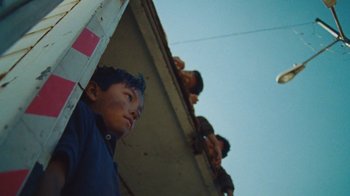 Movie still from “A.CHAL - Cuánto” (2018), directed by Dexter Navy – Close Up shot, Low angle