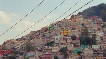Movie still from “A.CHAL - Cuánto” (2018), directed by Dexter Navy – Extreme Wide shot, Overhead angle