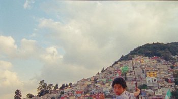 Movie still from “A.CHAL - Cuánto” (2018), directed by Dexter Navy – Extreme Wide shot, Low angle
