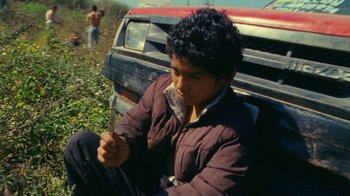 Movie still from “A.CHAL - Cuánto” (2018), directed by Dexter Navy – Medium shot, High angle