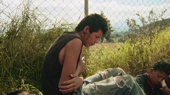 Movie still from “A.CHAL - Cuánto” (2018), directed by Dexter Navy – Medium shot, High angle