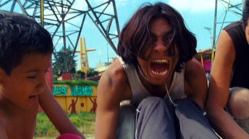 Movie still from “A.CHAL - Cuánto” (2018), directed by Dexter Navy – Close Up shot, Low angle