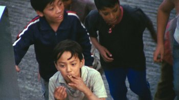 Movie still from “A.CHAL - Cuánto” (2018), directed by Dexter Navy – Medium shot, High angle