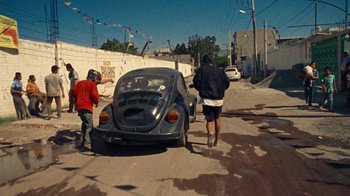 Movie still from “A.CHAL - Cuánto” (2018), directed by Dexter Navy – Wide shot, High angle