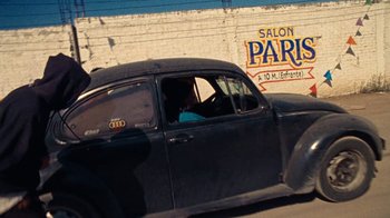 Movie still from “A.CHAL - Cuánto” (2018), directed by Dexter Navy – Wide shot, Over the shoulder angle