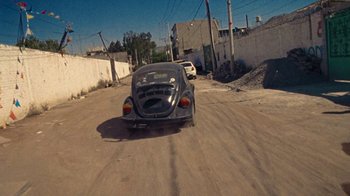 Movie still from “A.CHAL - Cuánto” (2018), directed by Dexter Navy – Wide shot, High angle