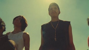 Movie still from “A.CHAL - Cuánto” (2018), directed by Dexter Navy – Medium shot, Low angle