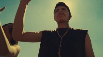 Movie still from “A.CHAL - Cuánto” (2018), directed by Dexter Navy – Close Up shot, Low angle