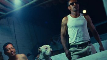 Movie still from “A.CHAL - Cuánto” (2018), directed by Dexter Navy – Medium shot, Low angle