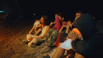 Movie still from “A.CHAL - Cuánto” (2018), directed by Dexter Navy – Medium shot, High angle