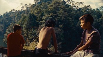 Movie still from “A.CHAL - Cuánto” (2018), directed by Dexter Navy – Medium shot, Low angle