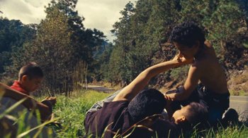 Movie still from “A.CHAL - Cuánto” (2018), directed by Dexter Navy – Medium shot, High angle