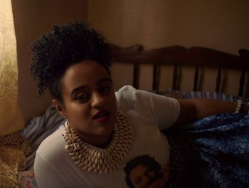 Movie still from “Seinabo Sey - I Owe You Nothing” (2018), directed by Sheila Johansson – Close Up shot, High angle