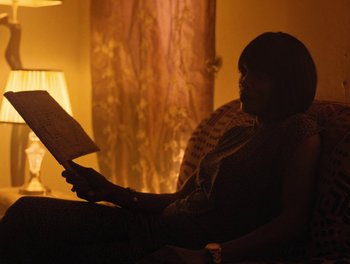 Movie still from “Seinabo Sey - I Owe You Nothing” (2018), directed by Sheila Johansson – Medium shot, High angle