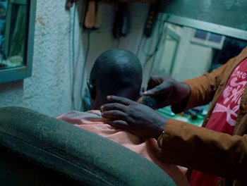 Movie still from “Seinabo Sey - I Owe You Nothing” (2018), directed by Sheila Johansson – Medium shot, High angle
