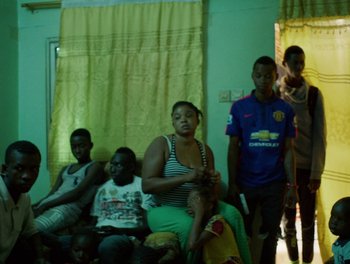 Movie still from “Seinabo Sey - I Owe You Nothing” (2018), directed by Sheila Johansson – Medium shot, High angle