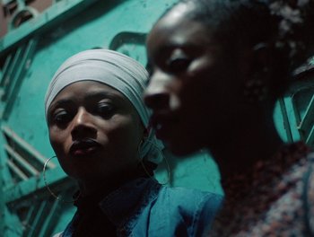 Movie still from “Seinabo Sey - I Owe You Nothing” (2018), directed by Sheila Johansson – Close Up shot, Low angle