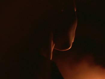 Movie still from “Seinabo Sey - I Owe You Nothing” (2018), directed by Sheila Johansson – Extreme Close Up shot, Low angle