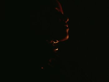 Movie still from “Seinabo Sey - I Owe You Nothing” (2018), directed by Sheila Johansson – Extreme Close Up shot, Low angle