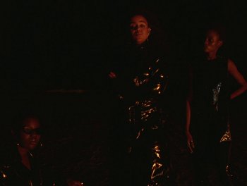 Movie still from “Seinabo Sey - I Owe You Nothing” (2018), directed by Sheila Johansson – Medium shot, Low angle