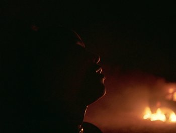Movie still from “Seinabo Sey - I Owe You Nothing” (2018), directed by Sheila Johansson – Extreme Close Up shot, Low angle