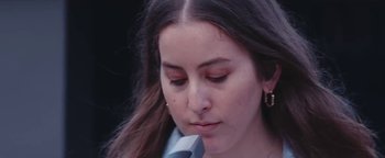 Movie still from “HAIM - Night So Long” (2018), directed by Paul Thomas Anderson – Close Up shot, Low angle