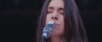 Movie still from “HAIM - Night So Long” (2018), directed by Paul Thomas Anderson – Close Up shot, Low angle