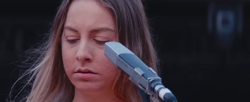 Movie still from “HAIM - Night So Long” (2018), directed by Paul Thomas Anderson – Extreme Close Up shot, Low angle