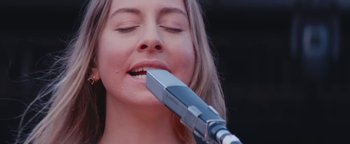 Movie still from “HAIM - Night So Long” (2018), directed by Paul Thomas Anderson – Close Up shot, Low angle