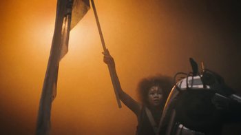 Movie still from “JAY-Z feat. Beyoncé - Family Feud” (2018), directed by Ava DuVernay – Medium shot, Low angle