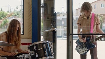 Movie still from “I Love LA - Starcrawler” (2017), directed by Autumn de Wilde – Medium shot, Low angle