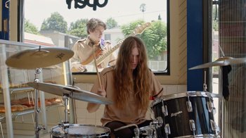 Movie still from “I Love LA - Starcrawler” (2017), directed by Autumn de Wilde – Medium shot, Over the shoulder angle