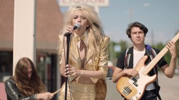 Movie still from “I Love LA - Starcrawler” (2017), directed by Autumn de Wilde – Medium shot, Low angle