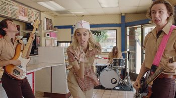 Movie still from “I Love LA - Starcrawler” (2017), directed by Autumn de Wilde – Medium shot, Low angle