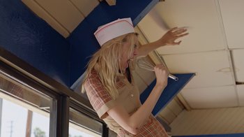 Movie still from “I Love LA - Starcrawler” (2017), directed by Autumn de Wilde – Medium shot, Low angle