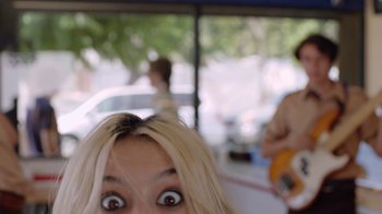 Movie still from “I Love LA - Starcrawler” (2017), directed by Autumn de Wilde – Extreme Close Up shot, Over the shoulder angle