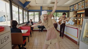Movie still from “I Love LA - Starcrawler” (2017), directed by Autumn de Wilde – Medium shot, Low angle