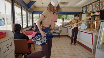 Movie still from “I Love LA - Starcrawler” (2017), directed by Autumn de Wilde – Medium shot, Low angle
