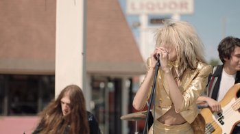 Movie still from “I Love LA - Starcrawler” (2017), directed by Autumn de Wilde – Medium shot, Low angle