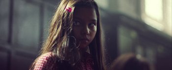 Movie still from “Harry Styles - Kiwi” (2017), directed by Us – Close Up shot, Over the shoulder angle