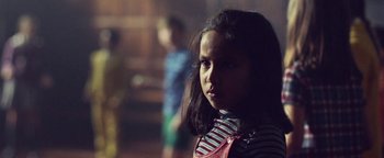 Movie still from “Harry Styles - Kiwi” (2017), directed by Us – Close Up shot, Over the shoulder angle